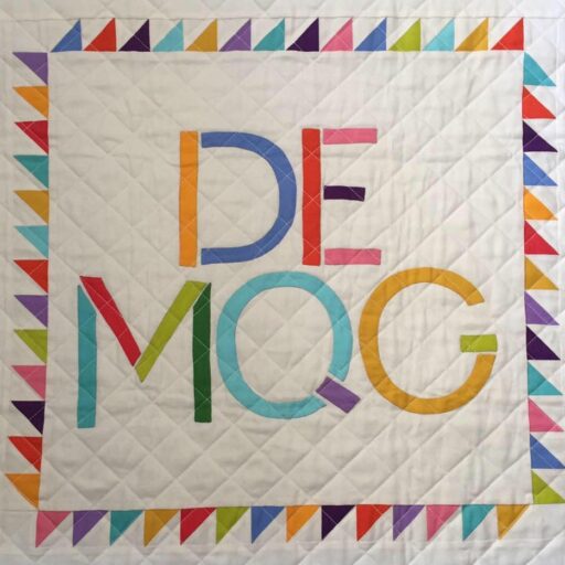https://www.demqg.com/wp-content/uploads/2025/12/cropped-DEMQG-Quilt-from-FB.jpg